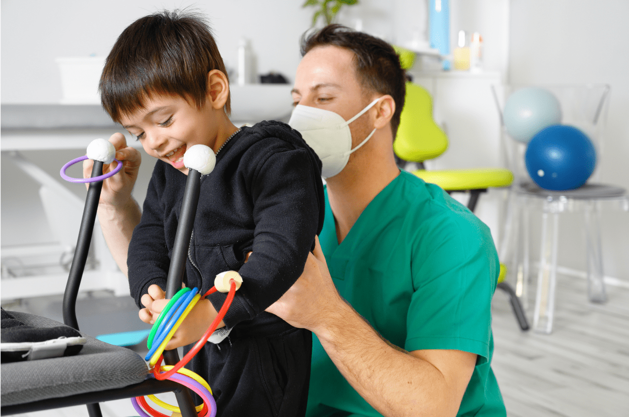 A nurse helping a pediatric patient