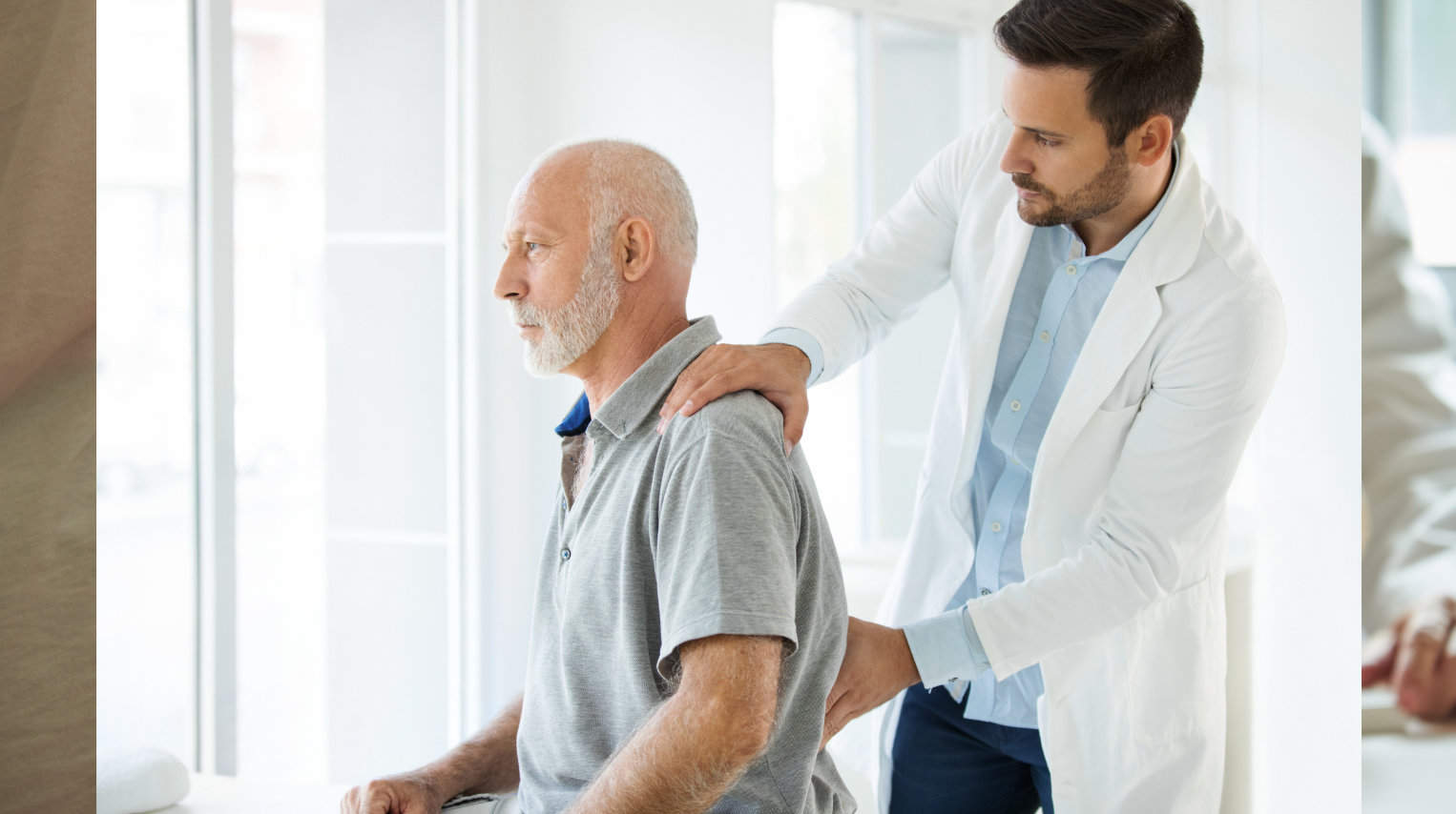 Physician checking patient for pain