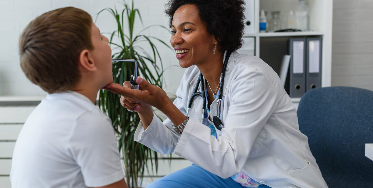 Pediatrician with child