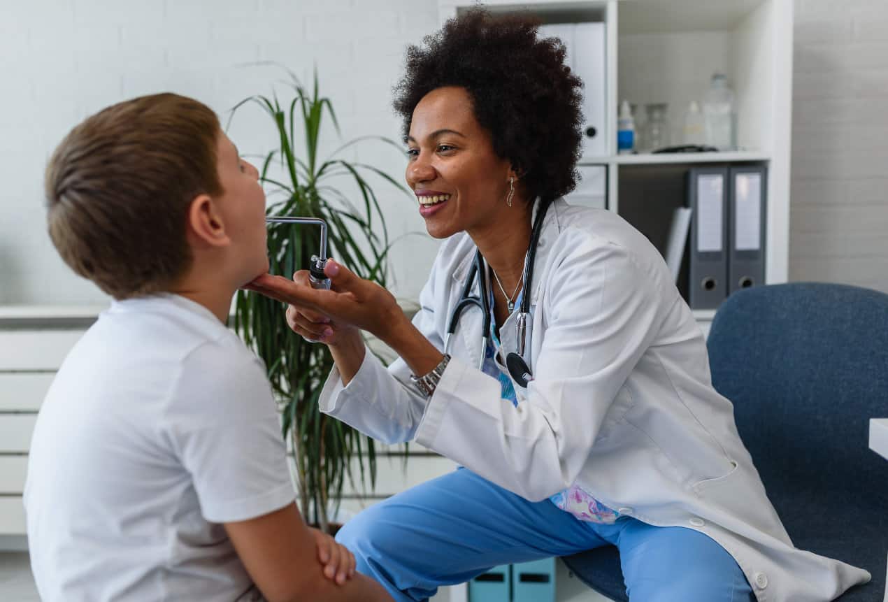 Pediatrician with child