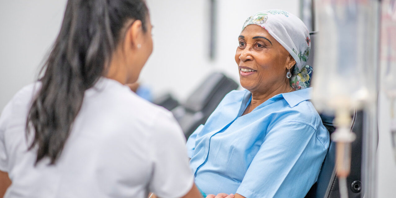 Oncologist with patient