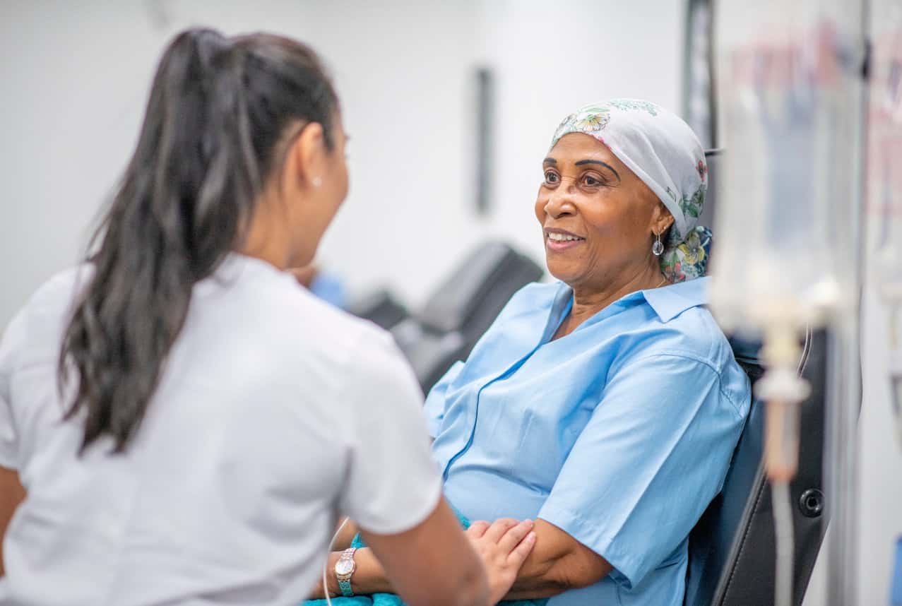 Oncologist with patient