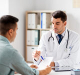 Physician informing patient
